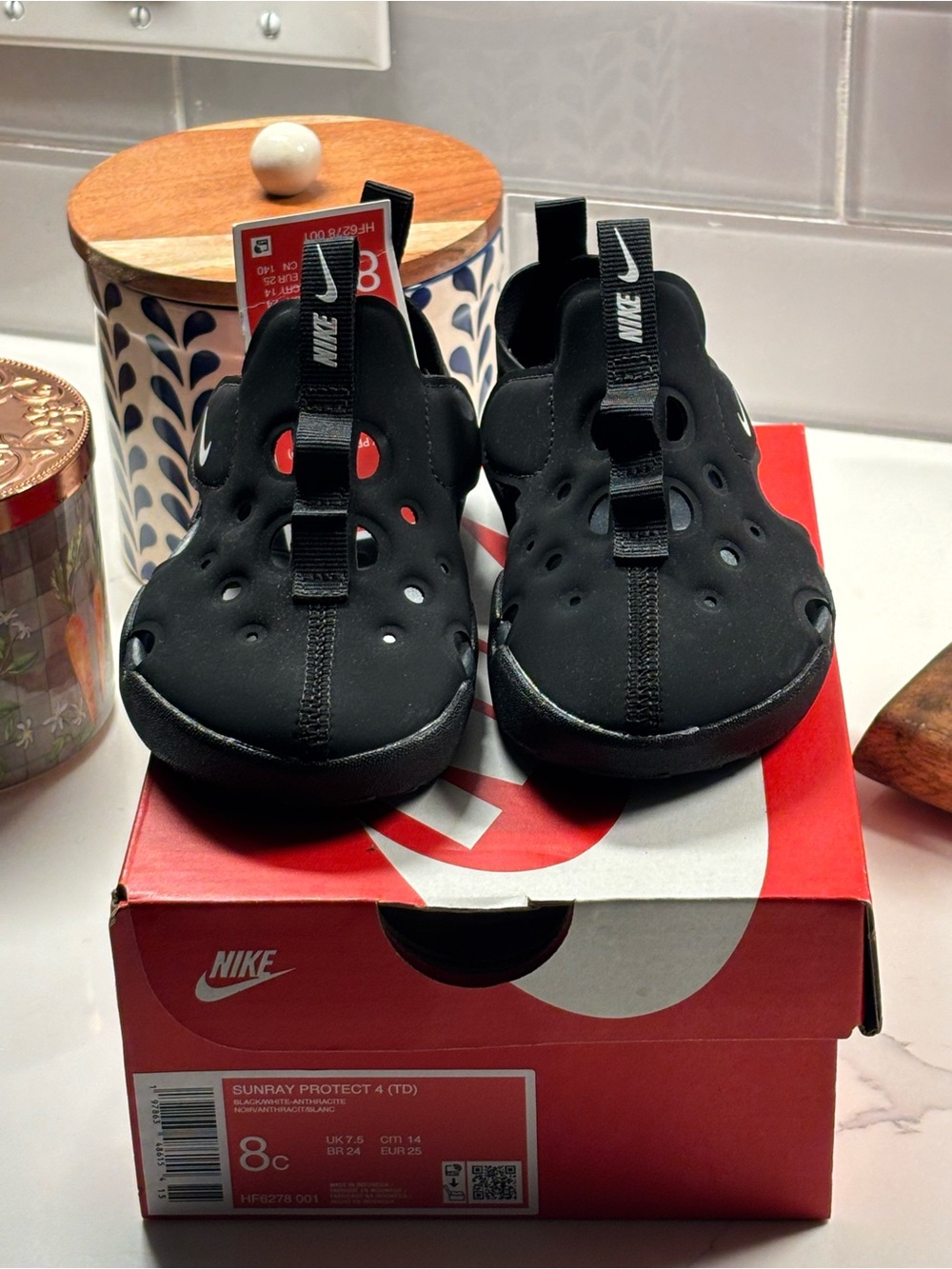 Nike Kids Black Water-Friendly Slip-On Sandals with White Swoosh